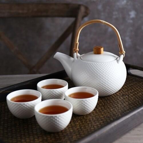 Household ceramic tea set a pot of four cups set creative afternoon tea cups Kung Fu Camellia teapot