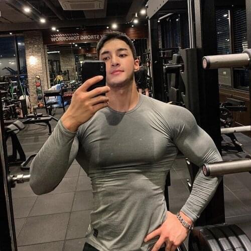 2021 new mens tights gym fitness T-shirt breathable long-sleeved moisture wicking stretch running top