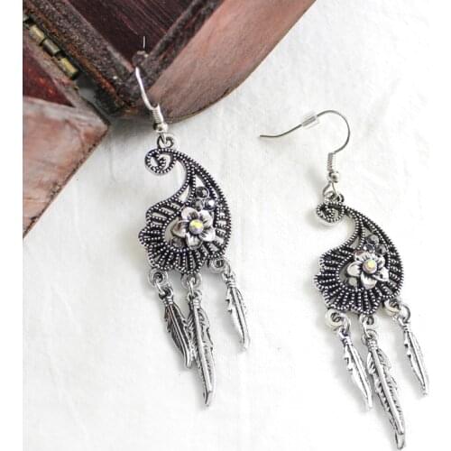 Hollow flowers metal tassel earrings retro irregular shape long earrings female charm to send friends mother girlfriend