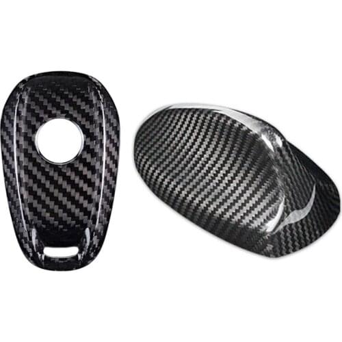 2 UDS auto parts: 1 UDS carbon fiber sheathed remote control car deck and 1 UDS true top carbon fiber flap shark fin deck
