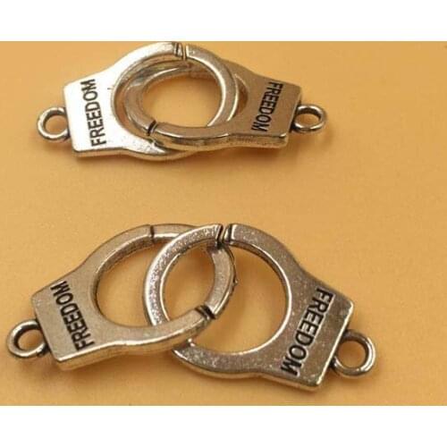 25pairs/lot Antique Silver Plated Alloy Handcuffs Charm Pendant Handmade Hanging Crafts 24x15mm