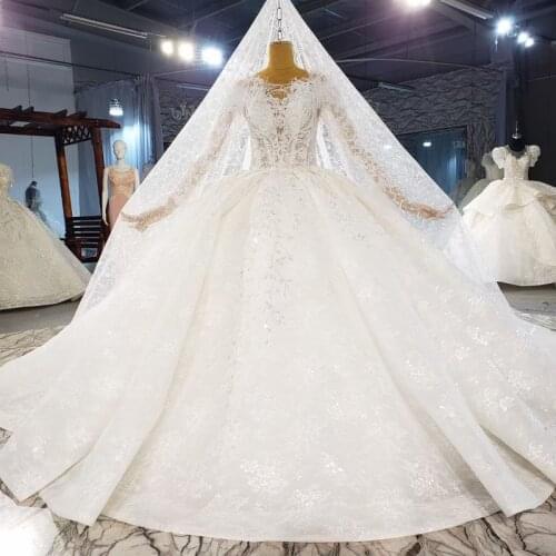 Luxury Long Sleeve Wedding Dresses Plus Size Ball Gown Crystals Beads Feathers Turkey Women Bridal Bride Gowns Dresses