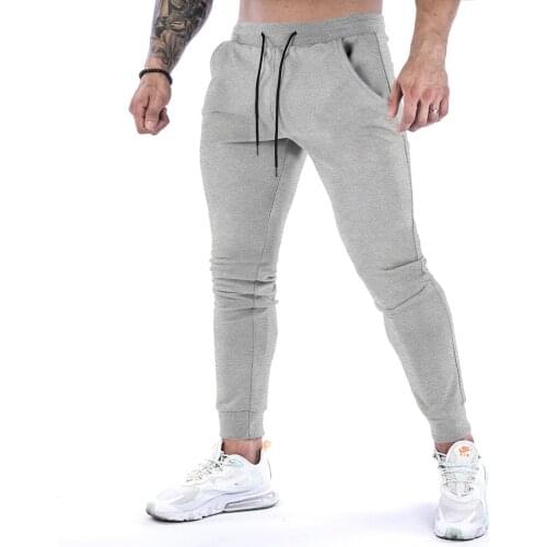 2021 new muscle fitness running training sports cotton trousers mens breathable Slim beam mouth casual health pants