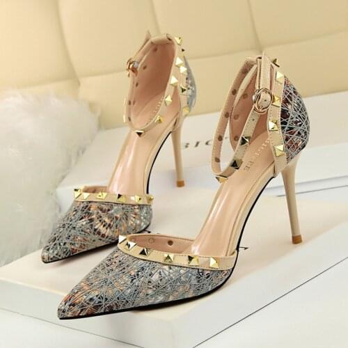 Women shoes 2021 Sexy stiletto sandals with stiletto heels, high heels and shallow mouth, pointed, hollow metal rivet