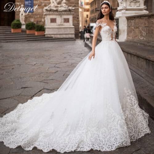 Detmgel Sexy Sweetheart Neck Appliques Backless A-Line Wedding Dresses 2020 Luxury Beaded Spaghetti Straps Princess Wedding Gown