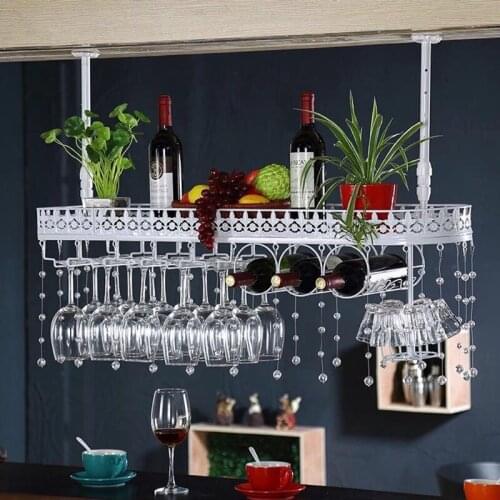 Hang red wine rack. Household glass frame. Hangs goblet