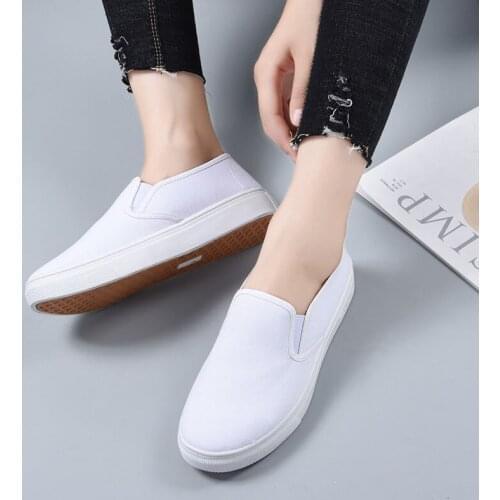 White shoes women spring and autumn new versatile low top board shoes street shot Korean Vogue ethnic ribbon casual hn7