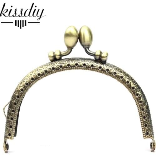 10pcs/lot DIY 9.5cm Bud antique Bronze Metal Purse Frame Handle for Bag Sewing Craft wholesale free shipping
