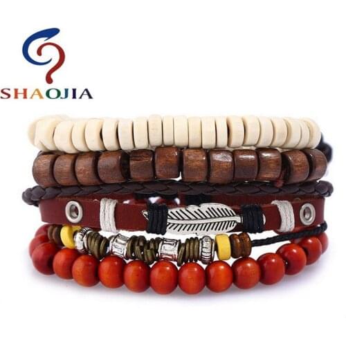 SHAOJIA 1Set 4pcs Leather Bracelet Women Multilayer Wood Bead Zinc Alloy Feather Bracelet Men Retro Leaves Bohemia Cuff Bracelet