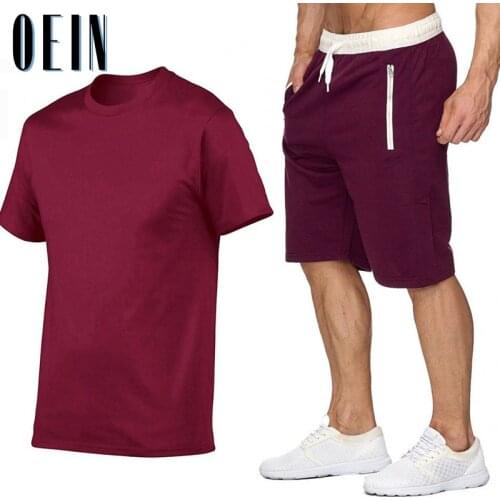 2021 New Tracksuit Men Sets Summer 2 Pieces Sportswear Set + Gym Fitness Sport Shorts Sets Mens Casual T Shirts Sweat Suit 2XL