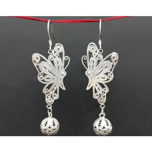 Hand-made silk-pinched Miao silver earrings fashion retro hollow Butterfly Ball Earrings free of freigh