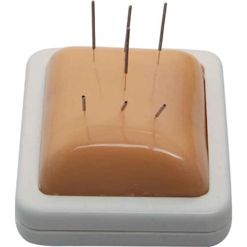 Acupuncture and moxibustion students practice acupoints