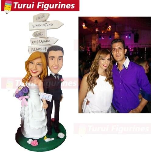 Holiday family couple figurine bobblehead dolls custom designed by Turui Figurines polymer clay dolls wedding cake topper custom