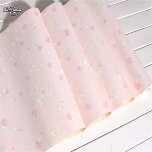 Beibehang Modern simple warm pastoral pink little plum wallpaper bedroom full shop small floral pvc wallpaper living room sofa