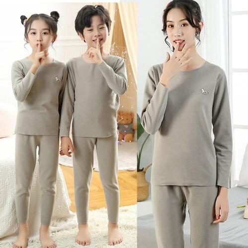 Family Matching Sleepwear Mother Kids Pajama Sets Baby Boys Thermal Underwear Change Color Logo 2021 Seamless Children Homewear