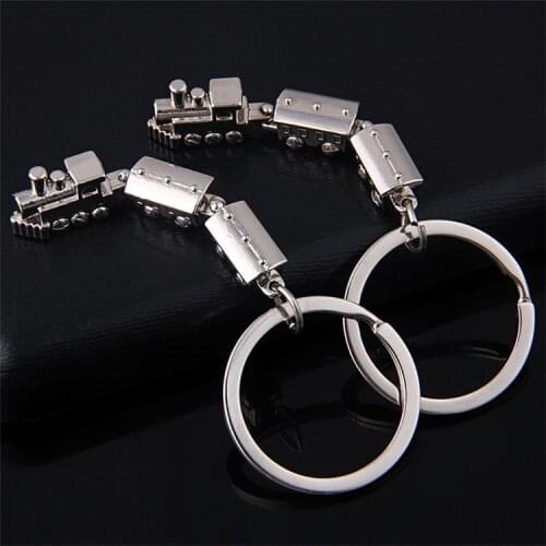 FREE SHIPPING BY DHL 100pcs/lot Novelty Mini Train Shaped Keychains Zinc Alloy Vintage Train Keyrings for Tourist Gifts