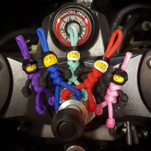 2021 New Building Block Smile Doll Toy Key Chains Biker Helmet Pendant Keychain Braided Rope Paracord Buddy Bag Car Hanging