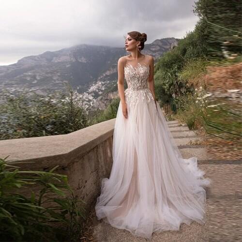 Illusion O-neck Applique Lace A-line Wedding Dress Sleeveless Button Back Sashes Tulle Sweep Train Wedding Gowns For Women