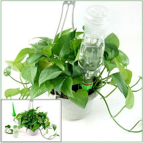 4Pcs Garden Cone Watering Spike Plant Flower Waterer Bottle Irrigation System Water spikes work wonders on thirsty potted plants