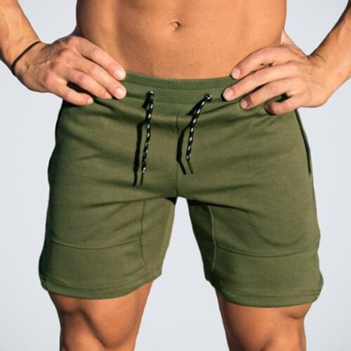 New Mens Sports Shorts Ropa Hombre Men Fashion Quick-drying Elasticity Breathable Casual Shorts For Summer Holiday