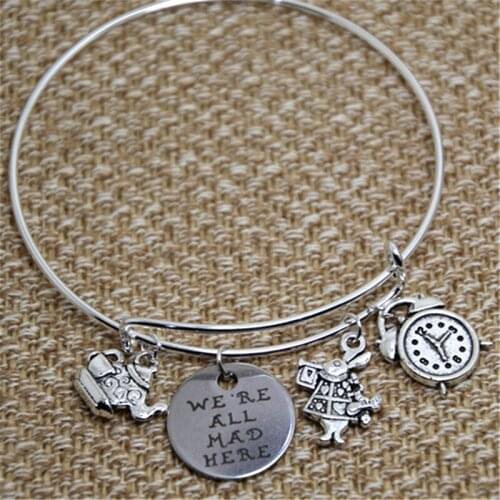12pcs Alice in wonderland Bracelet with rabbit clock tea kettle and cup and we are all mad here charms