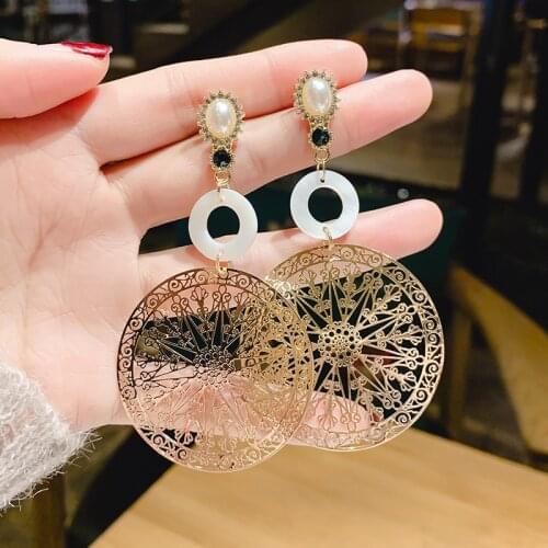 2020 fashion high sense creative earrings hollow round temperament ladies retro baroque female earrings