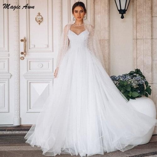 Magic Awn New Beach Wedding Dresses Full Puff Sleeves Pearls Beaded Princess Boho Mariage Gowns Illsuion A-Line Robe De Mariee