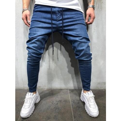 Autumn and winter new men casual sports jeans fashion drawstring side stripes color matching slim jeans male pencil pants