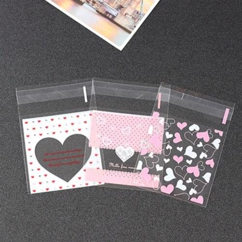 100pcs cute cartoon self-adhesive plastic bag heart-shaped pattern wedding birthday party gift biscuit candy gift packing bag