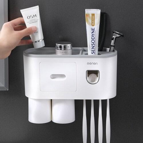 Creative toothbrush rack wall hanging mouthwash brushing cup bathroom storage automatic toothpaste squeezing device