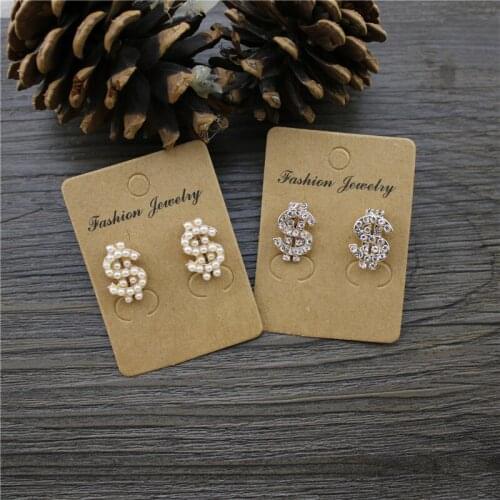 Japanese and Korean style sleek minimalist inlay imitation pearl semi-precious stone wild S-shaped symmetrical stud earrings