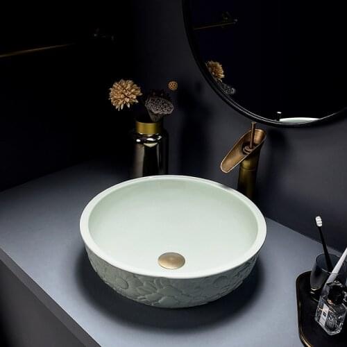 Jingdezhen carved sun flower above counter basin ceramic art wash basin bathroom retro wash basin household