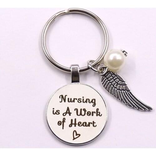 Nursing Is A Work Of Heart Keychain Pearl Wing Ornament Fashion Personality Women Jewelry Gift For Friends Women Girl