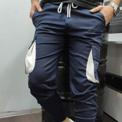 Mens overalls European and American outdoor multi-pocket trousers fitness running sports leisure loose feet trousers tide brand