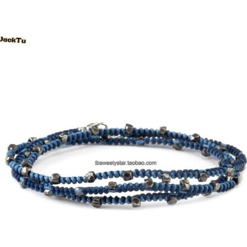 Gunmetal nuggets on blue color knotted bracelet men