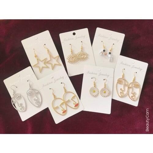 European and American fashion body earrings fashion pendant five-pointed star big eyes naked woman face earrings