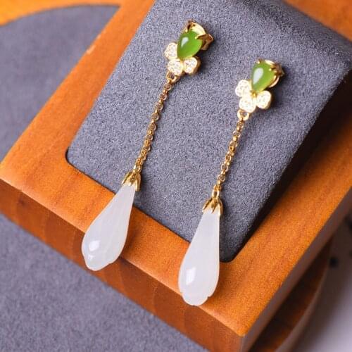 Silver inlaid natural Hetian White Magnolia long earrings Chinese style retro elegant charm light luxury womens jewelry