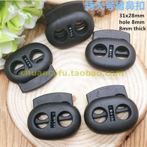 Free shipping 30 pcs/lot Black color cord lock cord stopper spring stopper garment/bag accessories