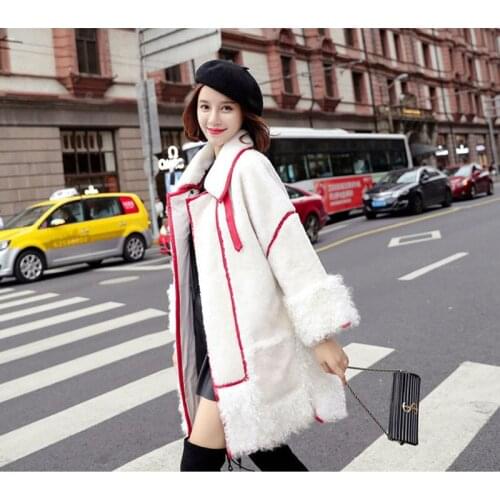 Woolen coat female 2019 New Women Fur coat fashion lapel Faux fur coat Long Stitching Faux Sheep Fur Jacket winter Woolen coat