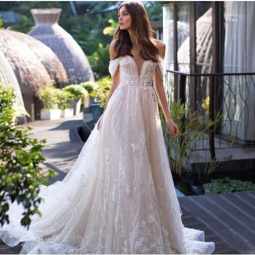 Gorgeous Wedding Dress 2021 A-Line Off Shoulder Lace Appliques Sequins Pearls Button Sweep Train Bridal Gown Vestidos De Noiva