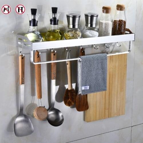 Punch-free kitchen racks wall-mounted multifunctional supplies household Daquan wall storage racks kitchen spice bottle racks