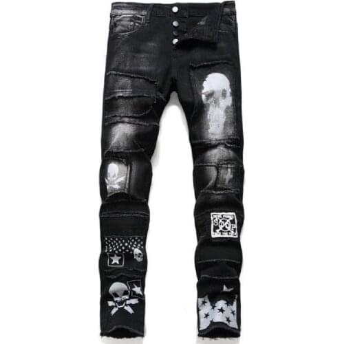 Mens jeans new European and American fashion black stretch jeans mens personality skull print simple wool edge casual jeans
