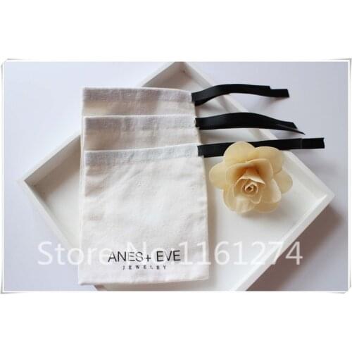Customized white cotton bag with black logo and black ribbon Jewelry gift pouch Free Shipping