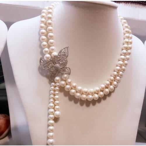 Fashion jewelry Free Shipping Hand knotted 9-10 mm white natural freshwater pearl bow micro inlay zircon clasp tassel necklace f