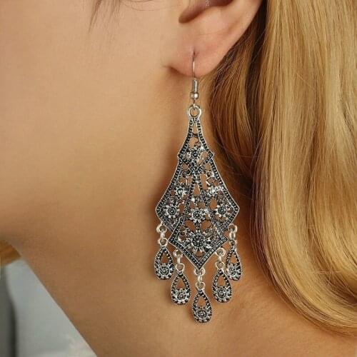 New Hot sale Bohemian Retro Hollow Earrings Carved Flower Long Dangle Earrings Ethnic Vintage Water Drop Tassel Eardrop