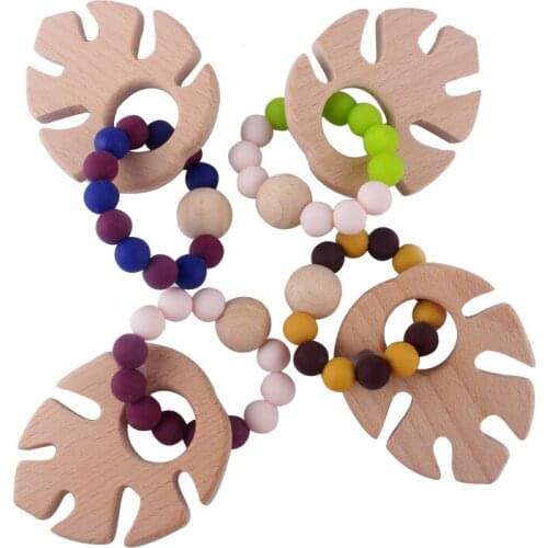 Baby Teether Toy Beech Wooden Teething Toy BPA Free Silicone Teething Bracelet Leaf Shape Wooden Teether Molar Product For Baby