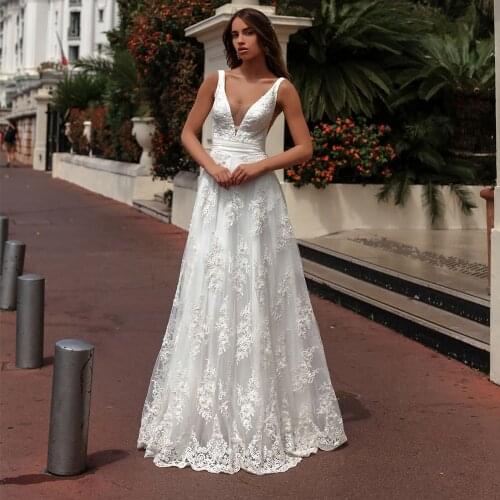Charming Sleeveless Lace Tulle Wedding Dress 2021 Sexy V-neck Applique A Line Bridal Gowns with Beading
