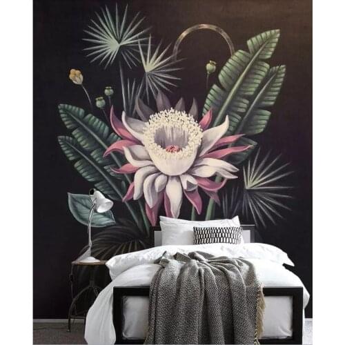 A medieval hand - painted decoration on a background wall of tropical plants and flowers