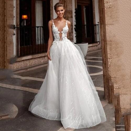 Sexy Deep V Neck Wedding Dresses Spaghetti Straps A Line Africa Lace Appliques Plus Size Tulle Bridal Gowns Free Shipping