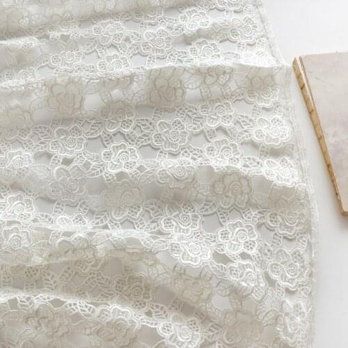 White stereoscopic shredded milk fabric Hollow out tissu Dress cheongsam fabric wedding dress sewing